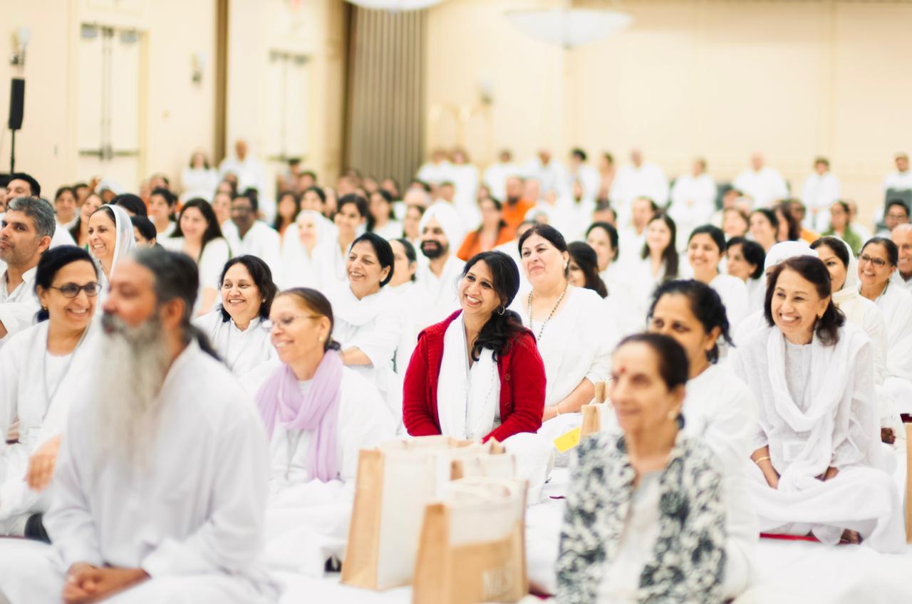 Seekers smiling together during a gathering