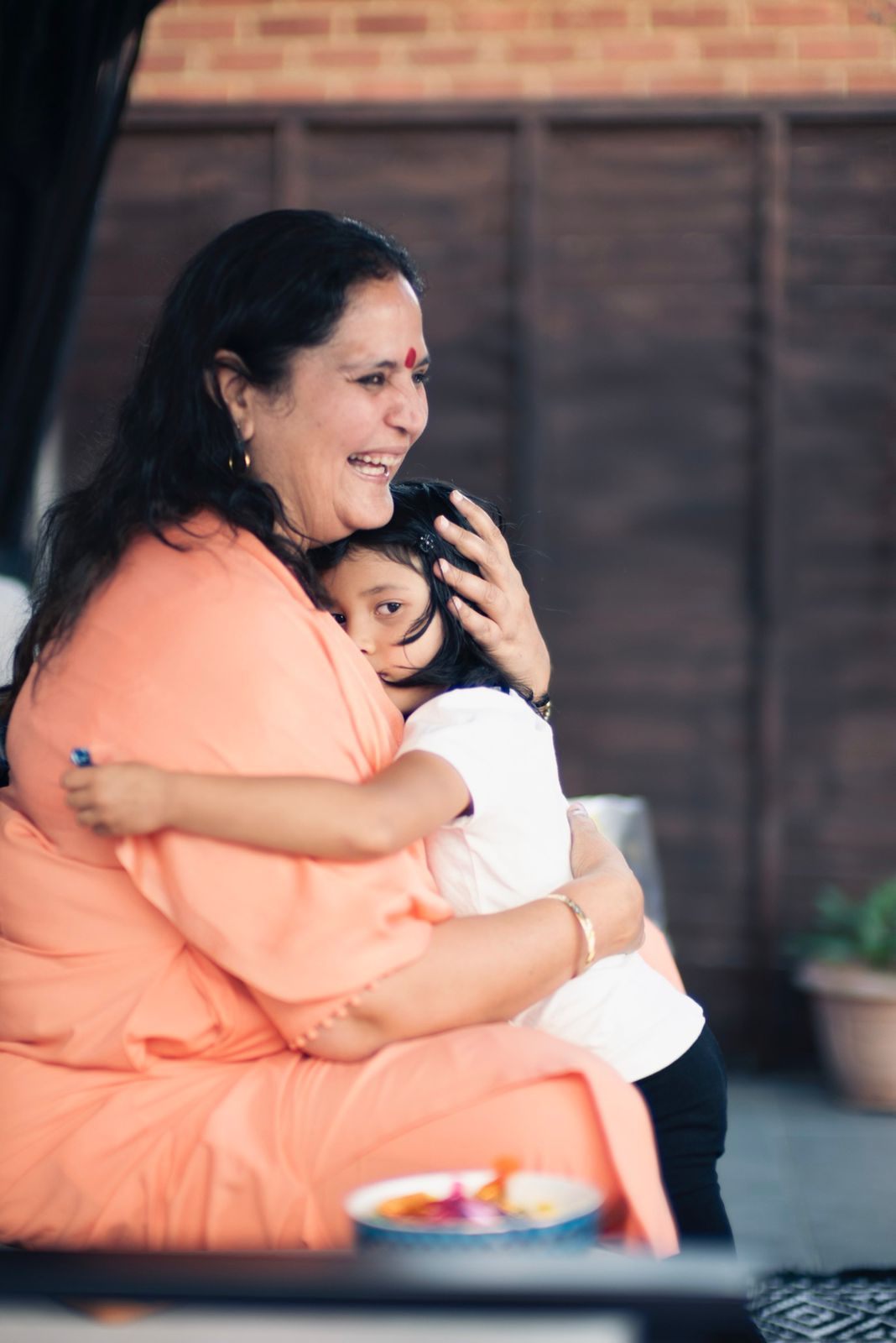 A tender embrace shared at a gathering